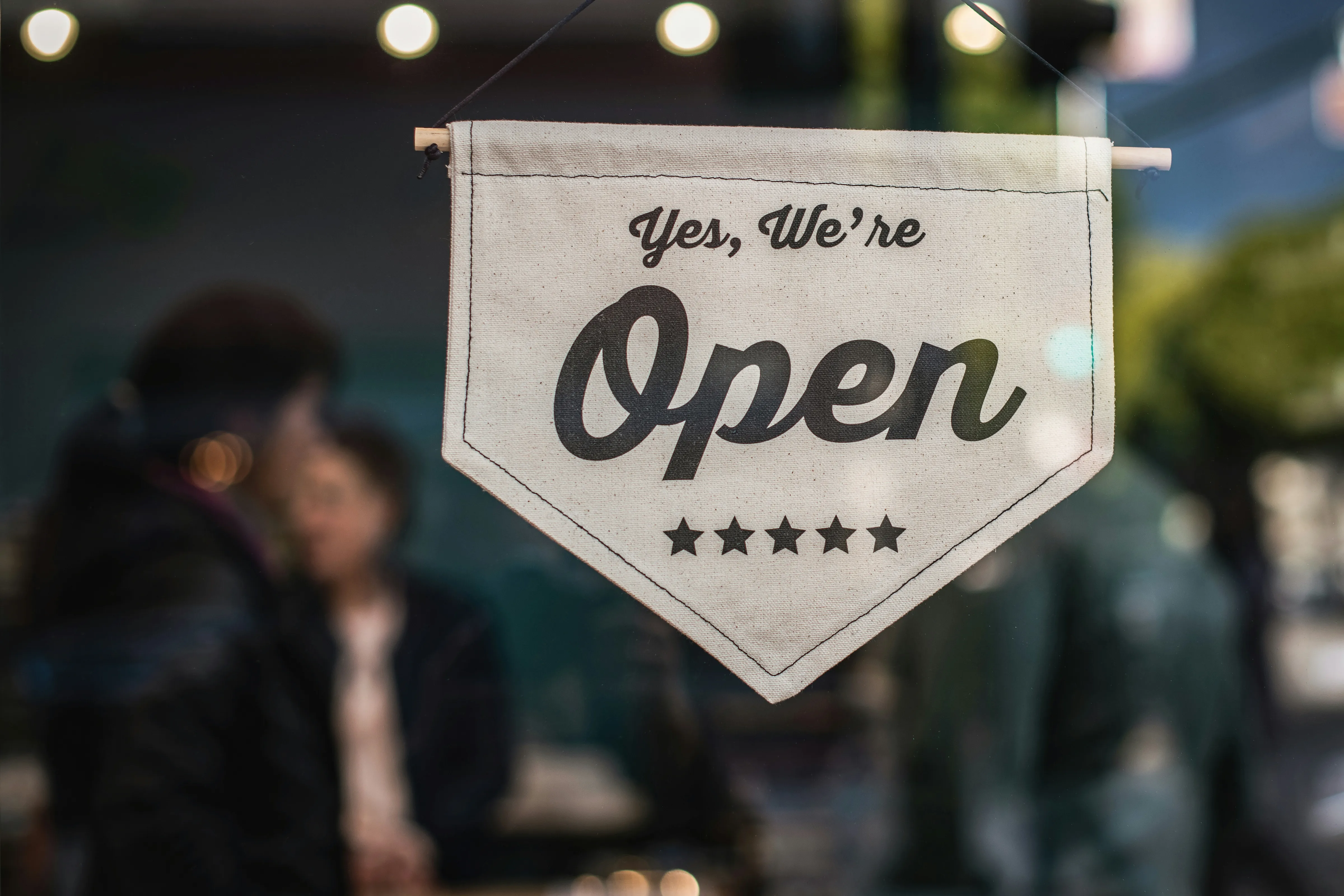 Small business owner implementing AI strategies